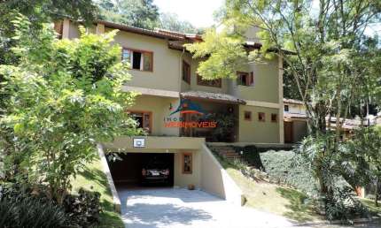 Luxuosa casa em condomínio à venda em Jandira-SP, bairro Jardim do Golf I: 4 quartos, 2 suítes, 3 salas, 5 banheiros, 4 vagas, 443,52m².