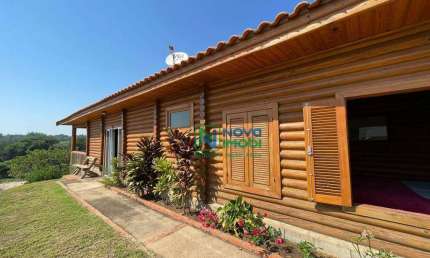 Viva o Sonho à Beira da Represa: Casa de Madeira em Condomínio Fechado a Venda, Santa Maria da Serras - SP