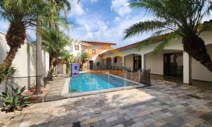 Imponente residência à venda na Vila Santa Catarina, Americana-SP: 4 quartos, 4 suítes, 3 salas, 5 banheiros, 8 vagas, 503m².