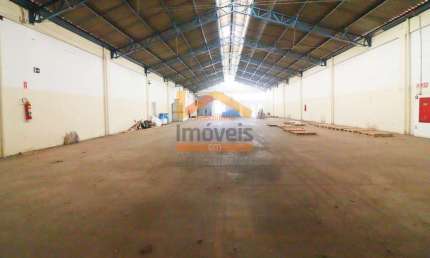 Salão industrial de 1.000m² com doca para caminhões em condomínio fechado com portaria 24 hs R$ 9.700,00
