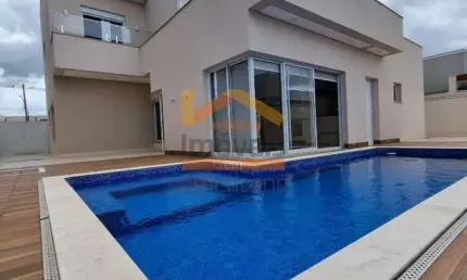 Casa de luxo em condomínio à venda em Americana-SP, com 4 quartos, 1 suíte, 2 salas, 3 banheiros e 2 vagas de garagem.