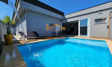 Casa de alto padrão em condomínio na Fazenda Santa Lúcia, Americana-SP: 3 quartos, 1 suíte, 3 salas, 3 banheiros, 4 vagas, 260m². Venha conhecer!