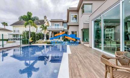 Linda Casa com 5 suítes e 3 vagas - Condomínio Alphaville Residencial 10.