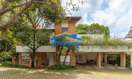 Casa em Condomínio em Jardim Cordeiro com 1.100m², 4 suítes, 5 vagas!