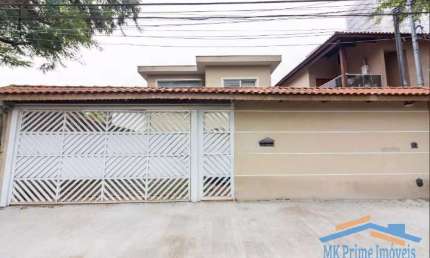 Excelente Sobrado com 3 Suítes, Sala 2 Ambientes e 4 Vagas de Garagem.