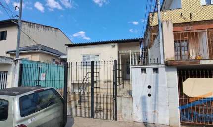 Terreno Jd. das Flores medindo 166 metros com duas casas. Valor:  480.000