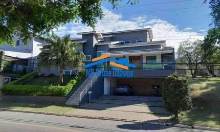 Casa em condomínio com 400m²  A.C Com  04 Quartos, 03 Suítes- TARUMÃ.