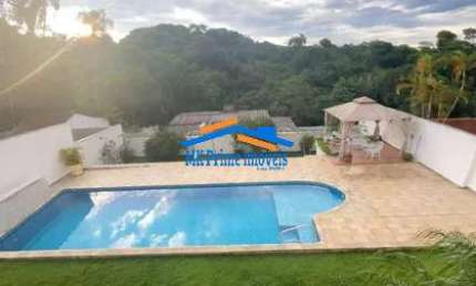 Casa ampla com piscina no condomínio Residencial Parque São Paulo - Cotia