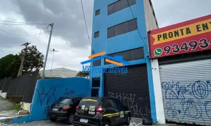 Prédio Comercial de 4 Andares com Salas Amplas e Vagas de Garagem.