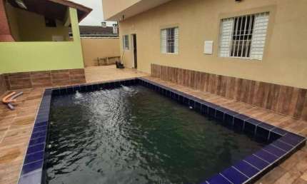 Excelente casa com 3 dormitórios sendo 1 suite área gourmet com piscinapor R$ 650.000.00- Jardim Mar E Sol - Peruíbe/SP