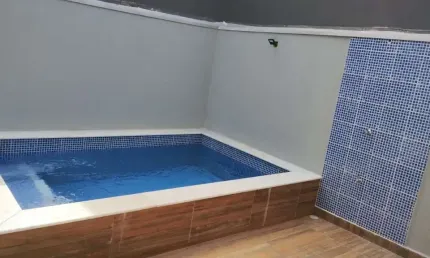 Sobrado com 3 dormitórios à venda, 119 m² por R$ 485.000,00 - Residencial Park D'Aville - Peruíbe/SP