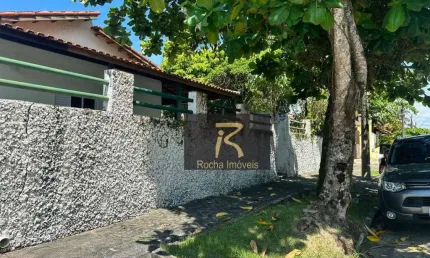 Oportunidade casa 2 lotes sendo 3 dormitórios 1 suite sala ampla  com varanda edícula 700 mts da praia bairro nobre R$ 600.000.00