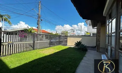 Excelente casa 3 dormitórios sendo 1 suíte com amplo espaço sala pé direto alto dois ambiente casa um show 150 mts da praia R$ 650.000.00