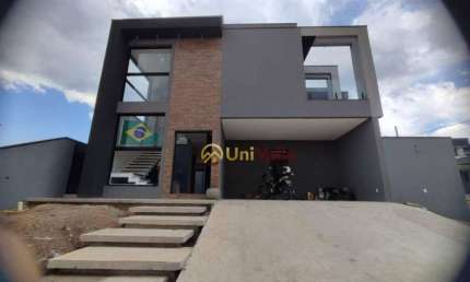 Sobrado com 4 dormitórios, 210 m² - venda por R$ 1.800.000,00 ou aluguel por R$ 8.580,00/mês - Condomínio Reserva Aruanã - São José dos Campos/SP