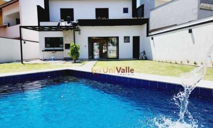 Sobrado com 3 dormitórios à venda, 215 m² por R$ 1.500.000,00 - Condomínio Parque das Araucárias - Tremembé/SP