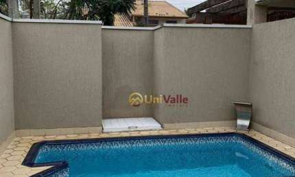 Casa com 3 dormitórios à venda, 150 m² por R$ 745.000 - Condomínio Hípica Pinheiro - Taubaté/SP