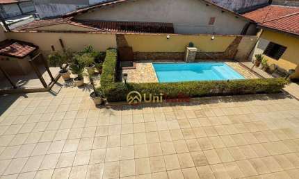 Casa com 4 dormitórios à venda, 349 m² por R$ 820.000,00 - Parque São Cristóvão - Taubaté/SP