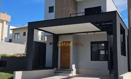 Casa com 3 dormitórios à venda, 134 m² por R$ 629.000 - Chácara Belo Horizonte - Taubaté/SP