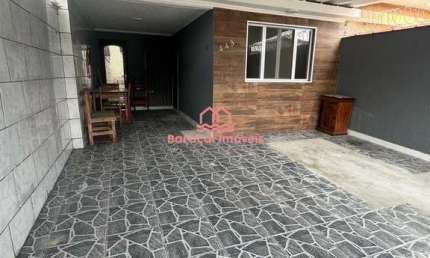 Casa  2 dormitórios à venda, 70m² por R$ 380.000,00 - Caiçara - Praia Grande/SP