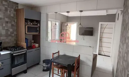 Casa térrea 2 quartos, 1 suíte garagem.3 carros Praia Grande
