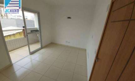 Apartamento com 2 dormitórios à venda, 55 m² por R$ 285.000,00 - Caiçara - Praia Grande/SP
