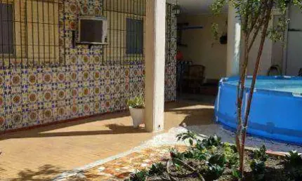 Casa com 3 dormitórios à venda, 191 m² por R$ 650.000,00 - Tupi - Praia Grande/SP