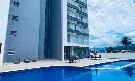 Apartamento novo, com dois dormitórios, em Caraguatatuba