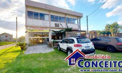 PC10 - Prédio comercial com apartamento localizado na avenida Principal