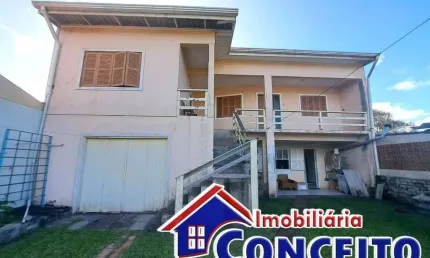 C394 - Ótimo sobrado com 02 apartamentos no balneário Albatroz