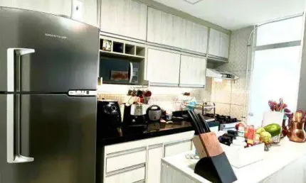 Apartamento com 2 dormitórios (1 suíte) à venda, 55 m² por R$ 340.000