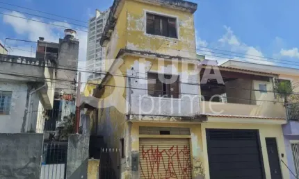 Terreno com casas no quintal de 125 metros à venda na Vila Ede