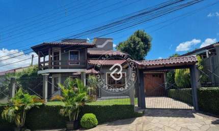 Sobrado com 3 dormitórios à venda, 250 m² por R$ 1.300.000,00 - Nossa Senhora das Graças - Canoas/RS