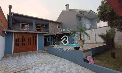 Sobrado com 3 dormitórios à venda, 180 m² por R$ 615.000 - Igara - Canoas/RS