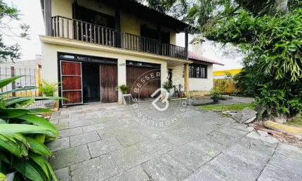 Sobrado com 4 dormitórios para alugar, 302 m² por R$ 5.129,00/mês - Vacchi - Sapucaia do Sul/RS