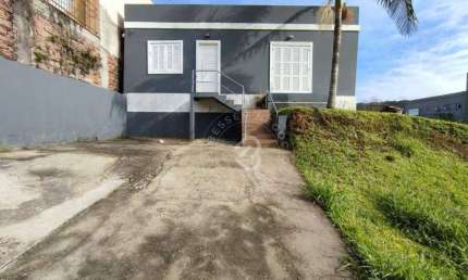 Casa com 2 dormitórios para alugar, 80 m² por R$ 2.879,00/mês - Jardim Anchieta - Sapucaia do Sul/RS
