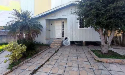 Casa com 2 dormitórios para alugar, 120 m² por R$ 1.550,00/mês - Santo Inácio - Esteio/RS