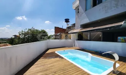 Casa à venda no bairro Belvedere, 3 quartos sendo 1 suíte e espaço gourmet.