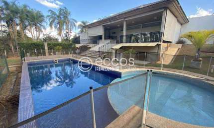 Casa em condomínio para aluguel, 6 quartos, 3 suítes, 4 vagas, Tocantins - Uberlândia/MG