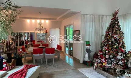 Casa em condomínio à venda, 4 quartos, 4 suítes, 6 vagas, Jardim Karaíba - Uberlândia/MG