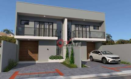 Sobrado com 3 dormitórios à venda, 119 m² por R$ 750.000,00 - Uirapuru - Itapoá/SC