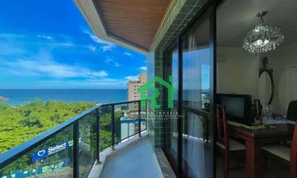 Apartamento à venda na Praia do Tombo I Rocha Imóveis Guarujá.