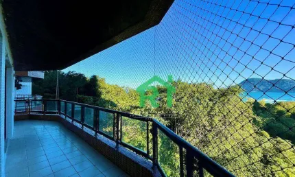 Apartamento à venda na Praia do Tombo I Rocha Imóveis Guarujá.