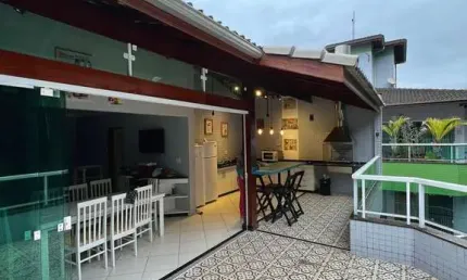Cobertura duplex na praia grande com vista parcial mar à venda