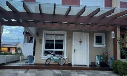 Casa em condomínio fechado com 3 quartos à venda na Avenida Obedy Cândido Vieira, 801, Distrito Industrial, Cachoeirinha por R$ 691.000