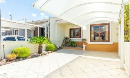 Casa em condomínio fechado com 3 quartos à venda na Avenida Frederico Augusto Ritter, 3601, Central Parque, Cachoeirinha por R$ 409.000