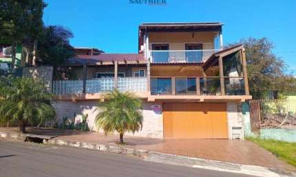 Casa com 3 quartos para alugar na Rua Rio Grande do Norte, 264, Camboim, Sapucaia do Sul