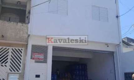 ** Terreno com 3 casas + 1 espaço comercial a venda na Vila Brasilina.
