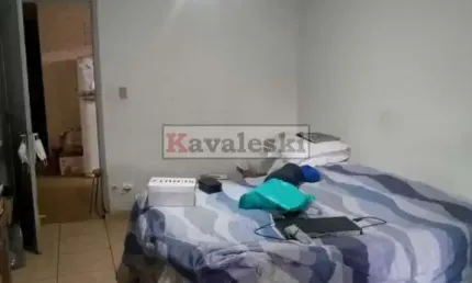 OPORTUNIDADE CASA TÉRREA COM 2 VAGAAS DE GARAGEM E BELO QUINTAL .