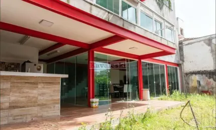 Sobrado impécável com 5 dormitórios 4 suites 3 vagas - Quintal imenso com área Gourmet- Imperdível