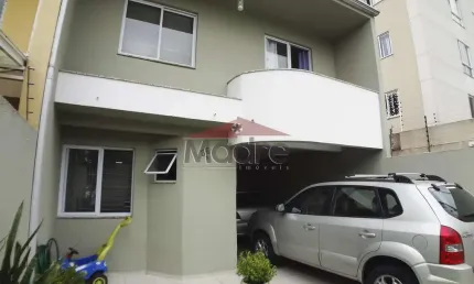 Casa com 3 quartos à venda na Rua Affife Mansur, 36, Novo Mundo, Curitiba, 108 m2 por R$ 720.000